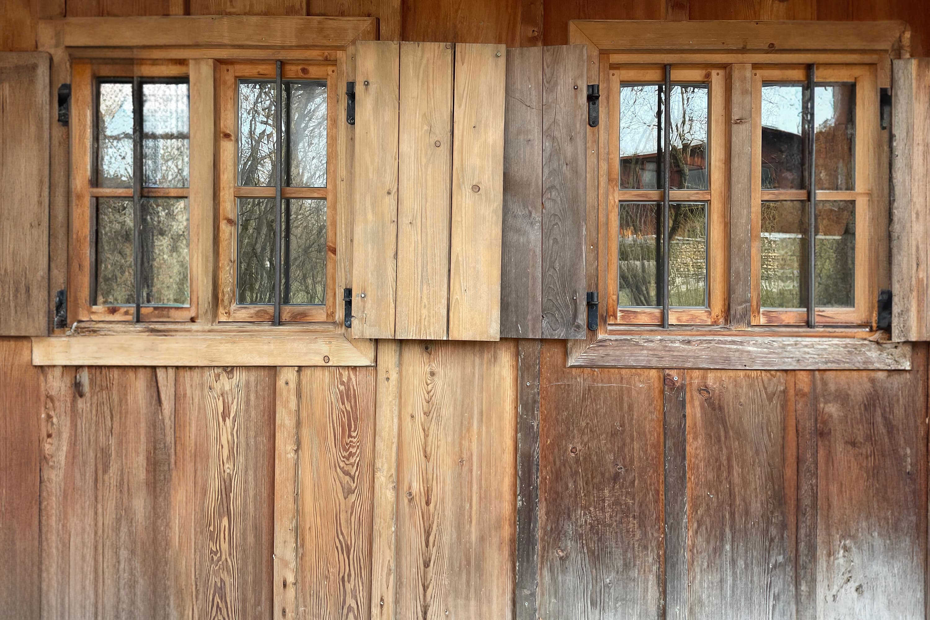 The difference before and after treatment with Wood Soap Plus Exterior is clearly visible.