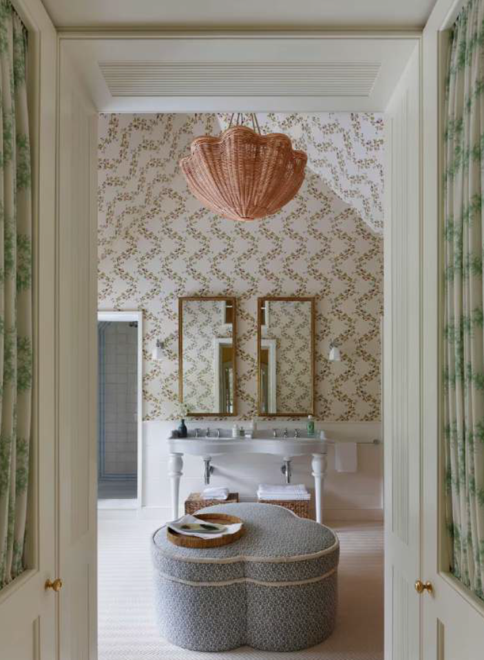 For Sarah Peake, bathrooms often feel ‘like a sterile afterthought’. Antique mirrors as cabinet fronts plus wall panelling can make them more welcoming © Alexander James